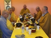 Monks and nuns at meal